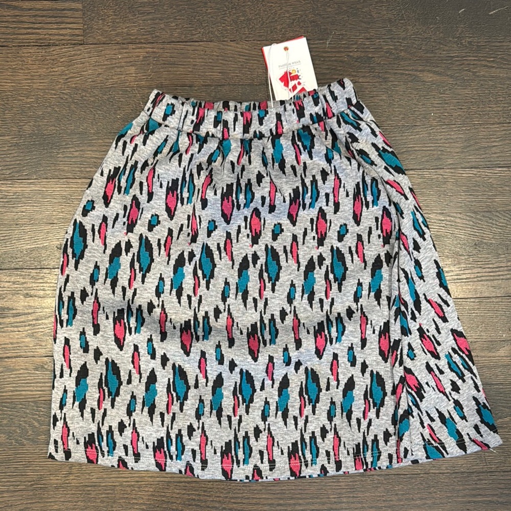 NWT Kidichic heather gray skirt with pink and blue cheetah pattern, size 10